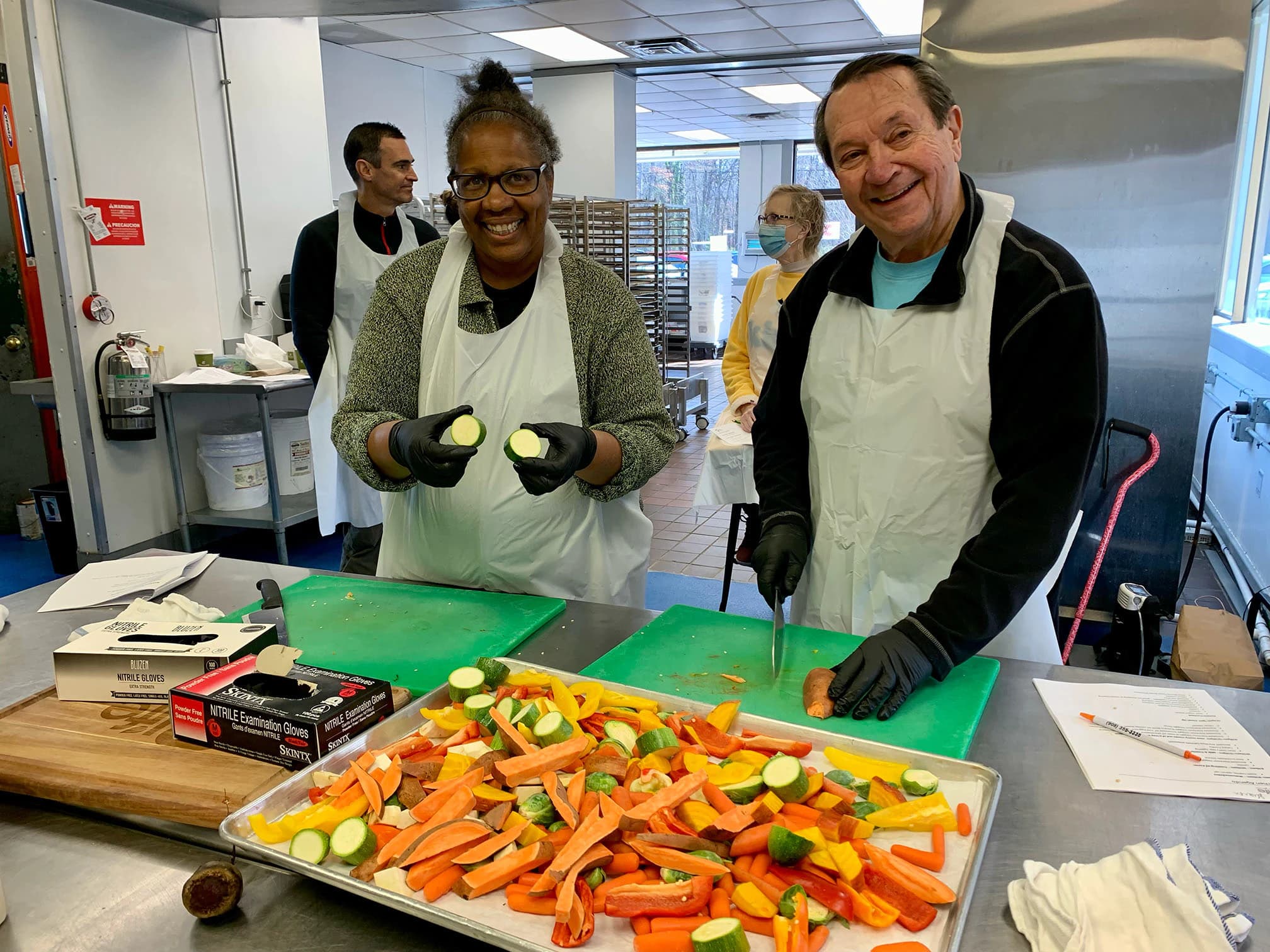 Community members preparing healthy food